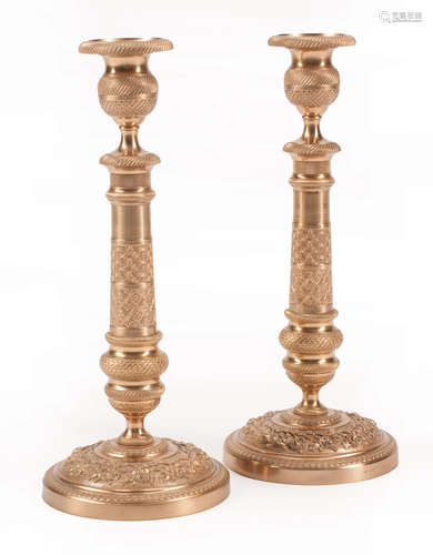 Pair of Charles X-Style Bronze Doré Candlesticks , with guilloche decoration, h. 11 in., dia. 4 1/