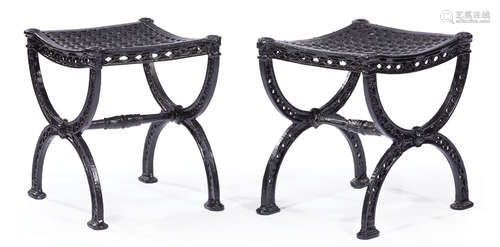 Pair of American Painted Cast Iron Curule Stools , 19th c., reticulated convex seat, foliate