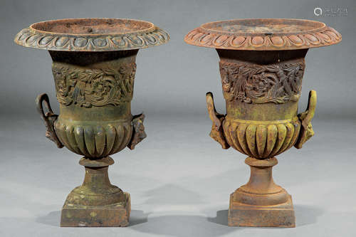 Pair of American Cast Iron Urns , 19th c., en suite with previous lot, h. 24 1/2 in., dia. 19 1/2 in