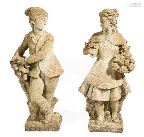 Pair of Antique Cast Stone Garden Figures , modeled as a young maiden and boy holding flowers,