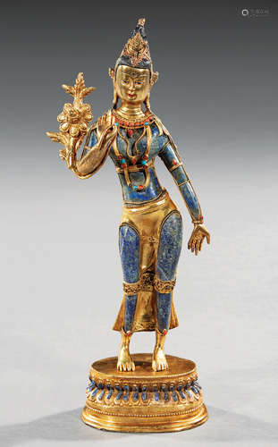 Tibetan Gem Embellished and Gilt Bronze-Mounted Lapis Lazuli Figure of Tara , modeled standing in