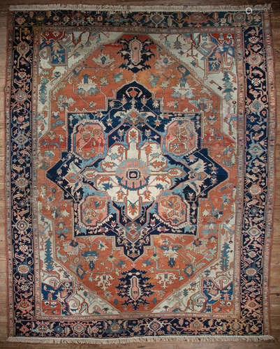 Serapi Rug , red and cream ground, central medallion, blue border, overall stylized floral design,