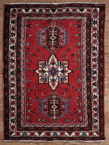 Persian Heriz Carpet , red ground, triple medallions, 3 ft. 9 in. x 5 ft. 5 in