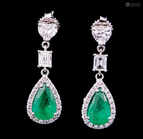 Pair 18 kt. White Gold, Emerald and Diamond Dangle Earrings , set with 2 pear shaped emeralds, total