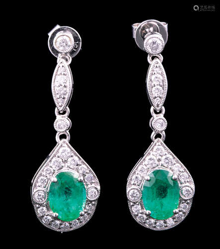 Pair of 18 kt. White Gold, Emerald and Diamond Earrings , 2 prong set emeralds with brilliant cut