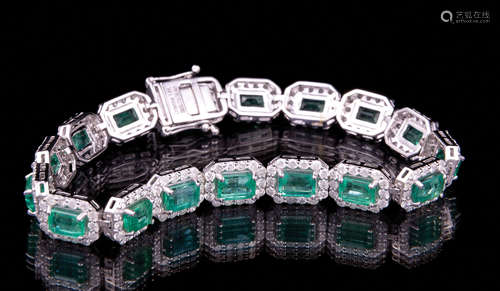 14 kt. White Gold, Emerald and Diamond Bracelet , 17 prong set rectangular step cut natural