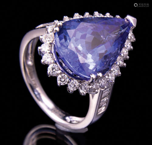 Platinum, Tanzanite and Diamond Ring , prong set pear shaped modified brilliant cut tanzanite, 17.40