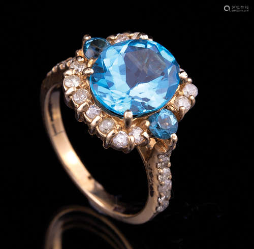 14 kt. White Gold, Blue Topaz and Diamond Ring , central round topaz flanked by 2 smaller stones,