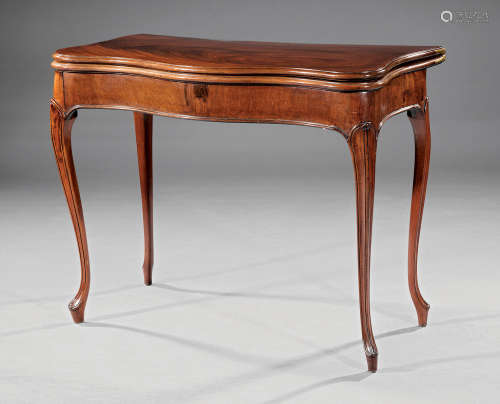 George III Figured Mahogany Concertina-Action Games Table , early 19th c., serpentine foldover