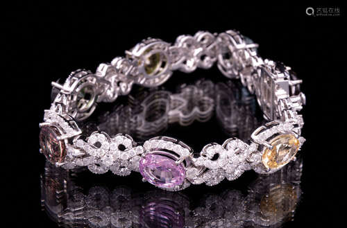 Rare 14 kt. White Gold, Sapphire and Diamond Bracelet , seven prong set oval mixed cut multicolor