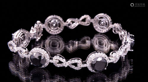 14 kt. White Gold, Black Diamond and Diamond Bracelet , 6 round brilliant cut black diamonds, 7.8-