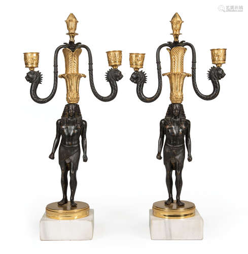 Pair of Egyptian Revival Gilt and Patinated Bronze Two-Light Candelabra , 19th c., candlearms with