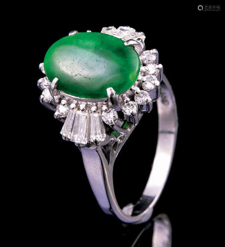 Platinum, Jadeite and Diamond Ring , cabochon jade surrounded by 14 round brilliant and 6 baguette