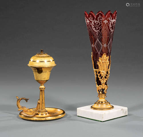 American Gilt Brass Chamberstick , 19th c., dolphin handle, matte and burnished surface, h. 7 in.;