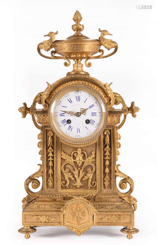 Napoleon III Gilt Bronze Mantel Clock , 19th c., urn finial with avian handles, scroll and foliate