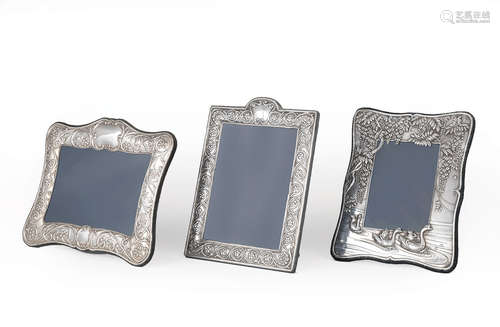 Three English Sterling Silver Picture Frames , Carr's of Sheffield, 20th c., all easel-back, one