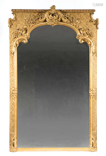 French Carved and Gilded Overmantel Mirror , mid-19th c., gadrooned cornice, rocaille crest, lattice