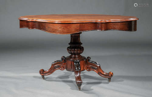 English Carved Rosewood Center Table , 19th c., shaped top, lobed standard, arched acanthine legs