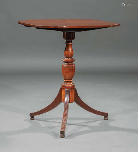 Small Regency Mahogany Tilt-Top Table , early 19th c., shaped top, vasiform standard, reeded sabre