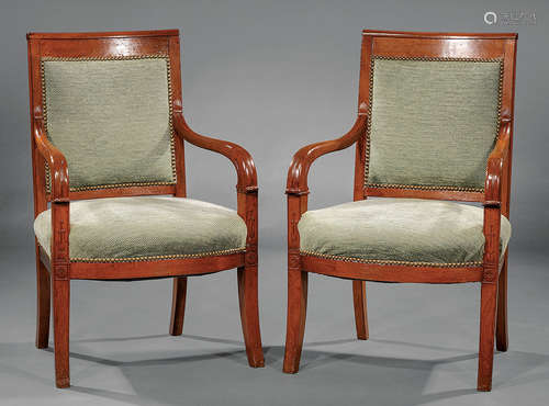 Pair of Louis Philippe Carved Mahogany Fauteuils , 19th c., scroll back crest rail, lappet-carved