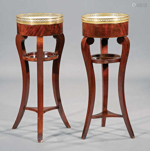 Pair of Antique Directoire-Style Brass-Mounted Mahogany Gueridons , galleried marble top, scrolled