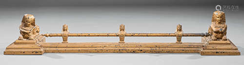 Late Regency Patinated Metal Figural Fire Fender , 19th c., rail with pharaoh busts, flanked by