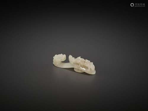 A SMALL WHITE JADE BELT HOOK, QING