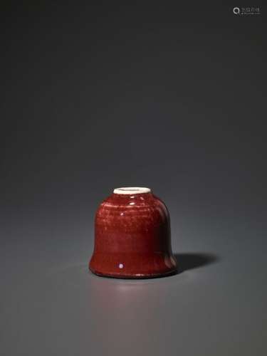 A COPPER RED GLAZED BEEHIVE WATER POT