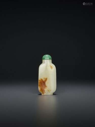 A WHITE AND RUSSET JADE SNUFF BOTTLE