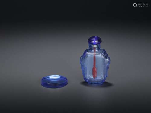 A SAPPHIRE BLUE GLASS SNUFF BOTTLE AND MATCHING SN…