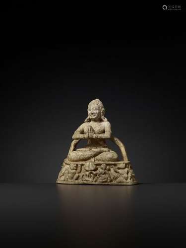 A RARE BONE CARVING OF BUDDHA