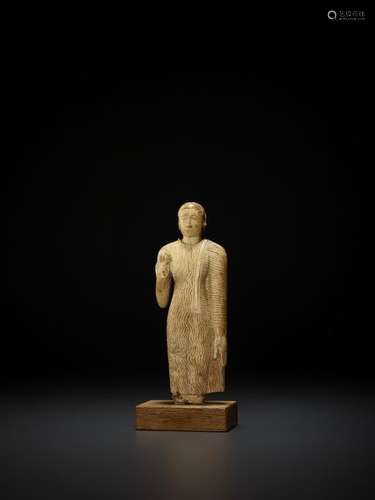 AN IVORY STATUE OF BUDDHA