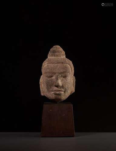 A FINE SANDSTONE HEAD OF BUDDHA, KHMER