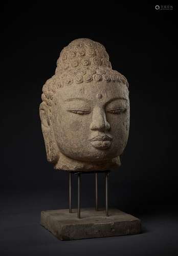 A LARGE AND IMPORTANT ANDESITE HEAD OF BUDDHA