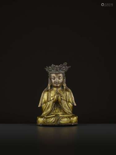 A GILT BRONZE FIGURE OF AVALOKITESVARA, MING DYNAS…