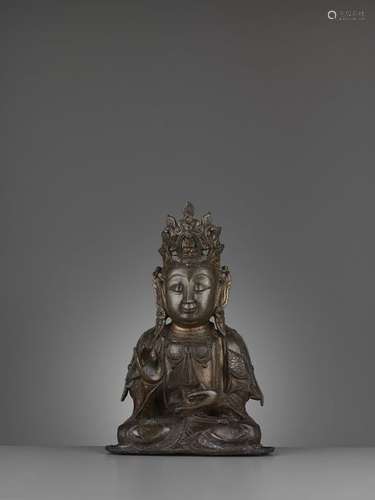 A BRONZE FIGURE OF GUANYIN, MING DYNASTY