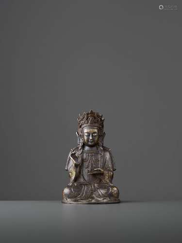 A FINELY CAST BRONZE GUANYIN, MING