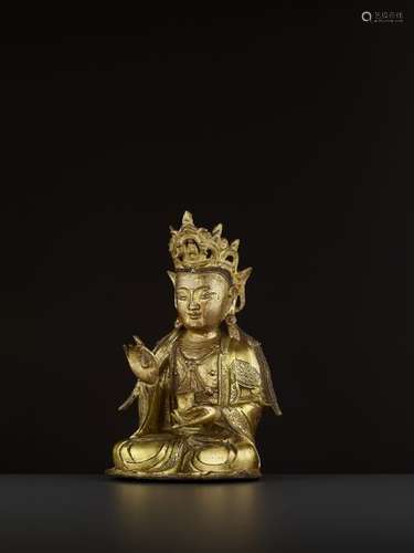 A FINELY CAST GILT BRONZE FIGURE OF GUANYIN, MING …