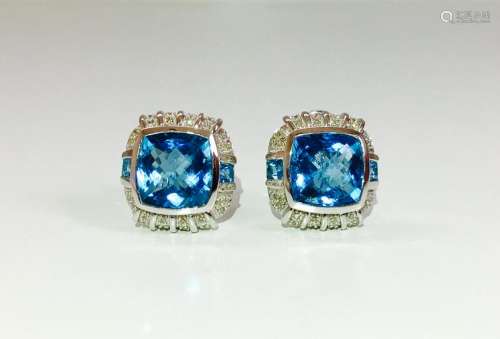 14K Gold, 8.00 carat blue topaz and diamond earrings.
