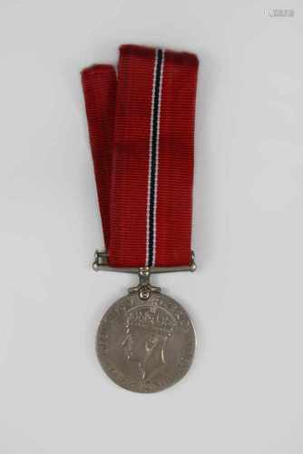 Britische Kriegsauszeichnung, War Medal 1939-1945, Kupfer versilbert, Inschrift: Avers: GEORGIVS