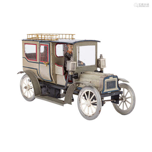 CARETTE Limousine, um 1910.Anthrazitfarbenes Blech, lithografiert, mit Fahrerfigur in brauner