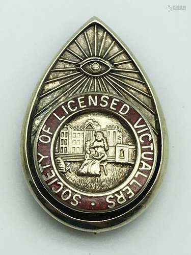 UNUSUAL SMALL ENAMELLED BROOCH OF SOCIETY OF LICENSED VICTUALLERS