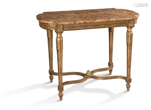 TABLE DE MILIEU en bois sculpté doré reposant sur …