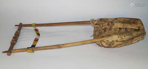 AfricanArtInstrumentKrar,Ethiopia-L.74cm,B.19cm(resonator).[...]