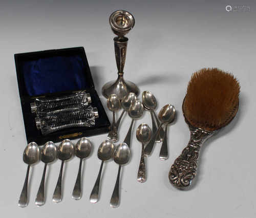 A set of six George V silver Old English pattern teaspoons, London 1912, a set of six silver Old