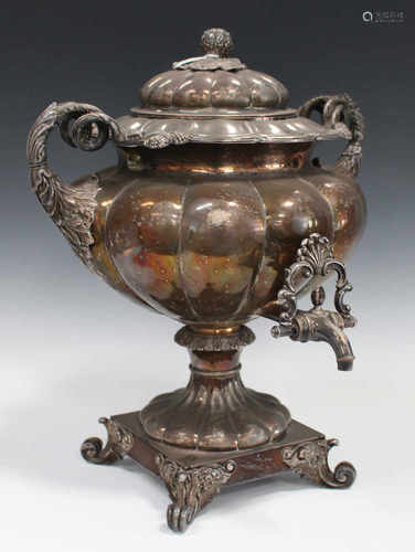 A William IV Sheffield plate samovar and cover, the lobed body flanked by a pair of foliate scroll