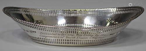 A late Victorian silver oval dish with pierced sides and embossed bellflower swags, Sheffield 1899