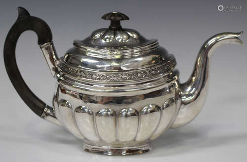 An early 19th century Russian silver bachelor's teapot, 84 zolotnik, of oval form, decorated with