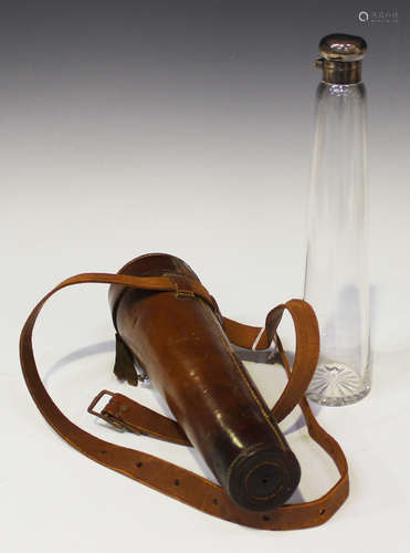 A late Victorian silver mounted clear glass hunting flask of conical form with silver collar and