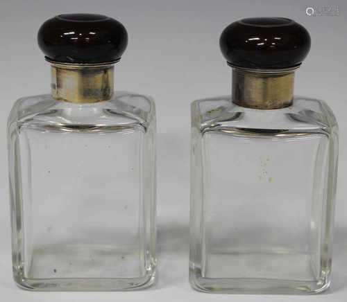 A pair of George V silver mounted rectangular cut glass scent bottles with faux tortoiseshell and